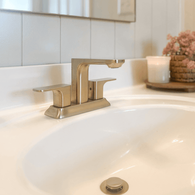 Corsica 2 Handle Centerset Brass Bathroom Faucet with drain assembly in Champagne Gold finish Corsica 2 Handle Centerset Brass Bathroom Faucet with drain assembly in Champagne Gold finish