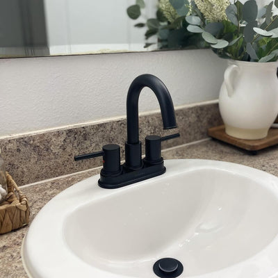 St. Lucia 2 Handle Centerset Brass Bathroom Faucet with drain assembly in Matte Black finish St. Lucia 2 Handle Centerset Brass Bathroom Faucet with drain assembly in Matte Black finish