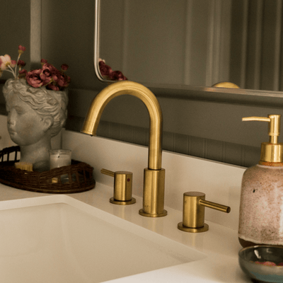 St. Lucia 2 Handle 3 Hole Widespread Brass Bathroom Faucet with drain assembly in Champagne Gold finish St. Lucia 2 Handle 3 Hole Widespread Brass Bathroom Faucet with drain assembly in Champagne Gold finish