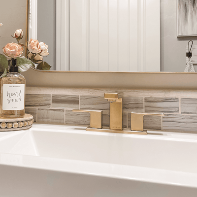 Capri 2 Handle 3 Hole Centerset Brass Bathroom Faucet with drain assembly in Champagne Gold finish Capri 2 Handle 3 Hole Centerset Brass Bathroom Faucet with drain assembly in Champagne Gold finish