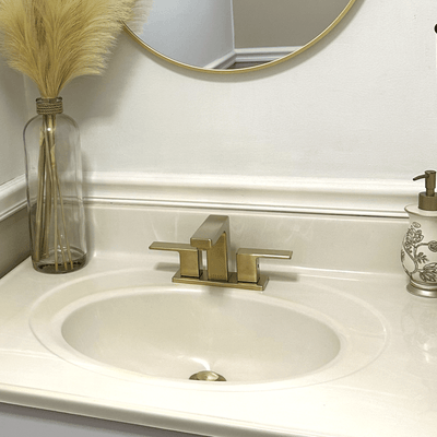 Capri 2 Handle 3 Hole Centerset Brass Bathroom Faucet with drain assembly in Champagne Gold finish Capri 2 Handle 3 Hole Centerset Brass Bathroom Faucet with drain assembly in Champagne Gold finish