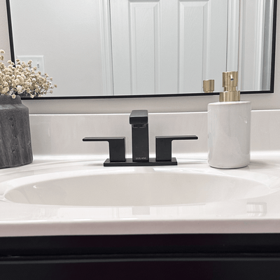 Capri 2 Handle 3 Hole Centerset Brass Bathroom Faucet with drain assembly in Matte Black finish Capri 2 Handle 3 Hole Centerset Brass Bathroom Faucet with drain assembly in Matte Black finish