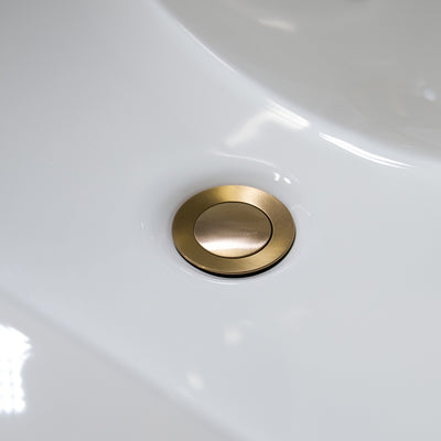 Bathroom sink pop-up drain without overflow in Brushed Gold finish Bathroom sink pop-up drain without overflow in Brushed Gold finish