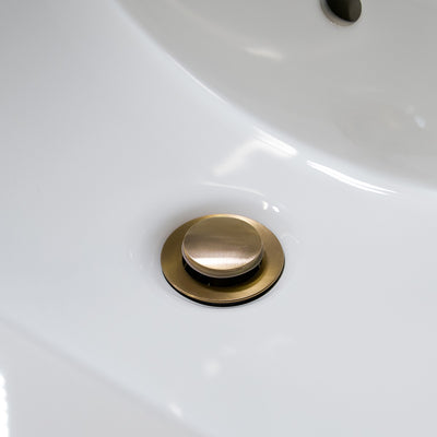 Bathroom sink pop-up drain without overflow in Brushed Gold finish Bathroom sink pop-up drain without overflow in Brushed Gold finish