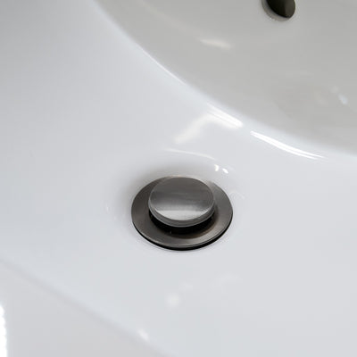 Bathroom sink pop-up drain without overflow in Gun Metal finish Bathroom sink pop-up drain without overflow in Gun Metal finish