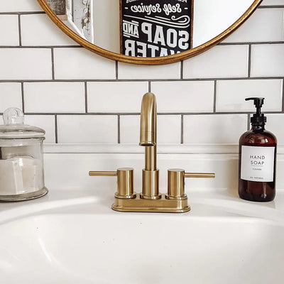 St. Lucia 2 Handle Centerset Brass Bathroom Faucet with drain assembly in Champagne Gold finish St. Lucia 2 Handle Centerset Brass Bathroom Faucet with drain assembly in Champagne Gold finish