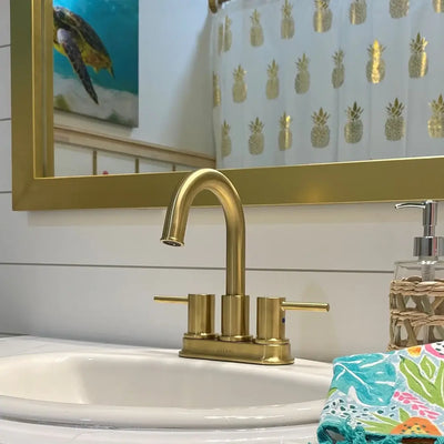 St. Lucia 2 Handle Centerset Brass Bathroom Faucet with drain assembly in Champagne Gold finish St. Lucia 2 Handle Centerset Brass Bathroom Faucet with drain assembly in Champagne Gold finish