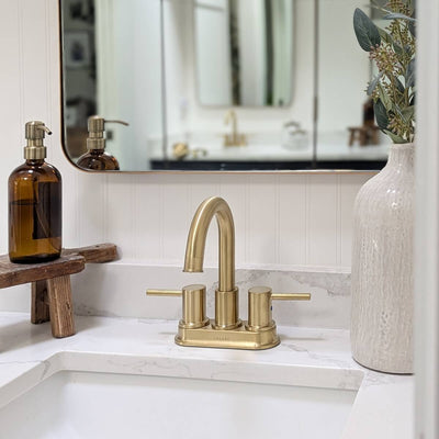 St. Lucia 2 Handle Centerset Brass Bathroom Faucet with drain assembly in Champagne Gold finish
