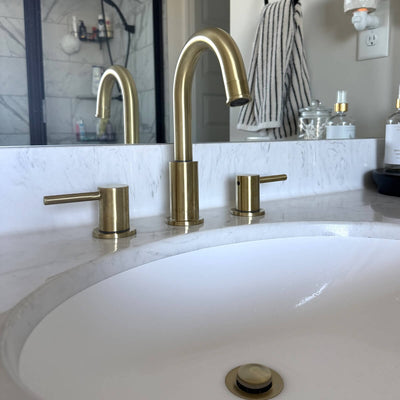 St. Lucia 2 Handle 3 Hole Widespread Brass Bathroom Faucet with drain assembly in Champagne Gold finish