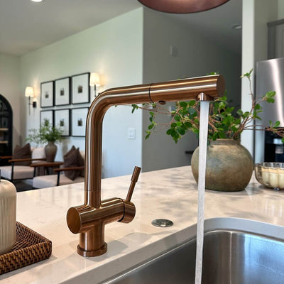 Nassau Stainless Steel 1 Handle Pull-Out Swivel Kitchen Faucet with PVD Finish Includes Baseplate in Rose Gold finish